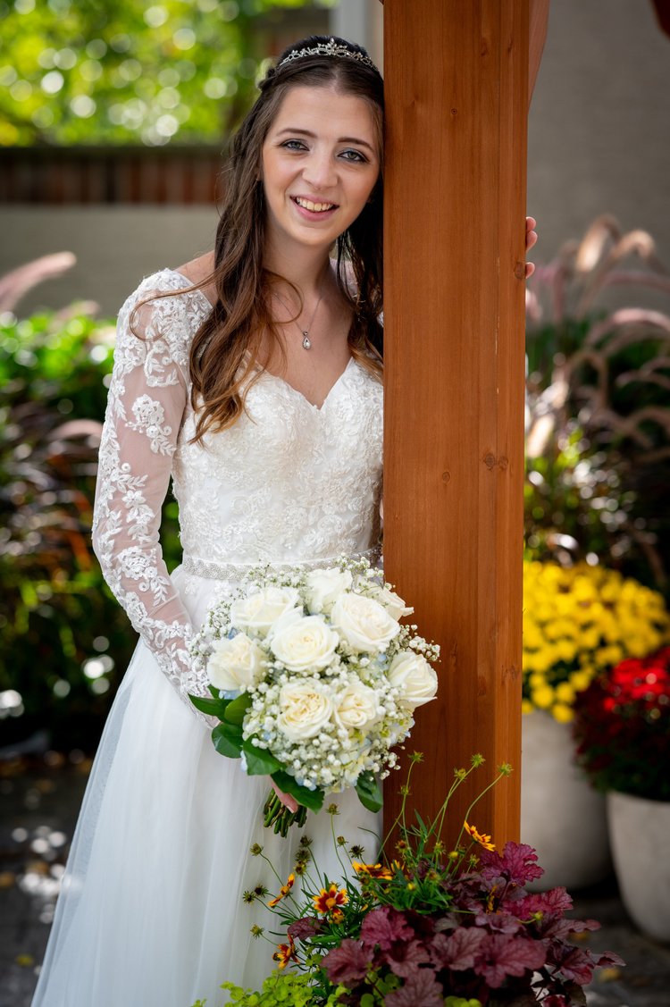 Wedding bridal bouquet with the gown, detail 3 by Domenic Graziano Flowers