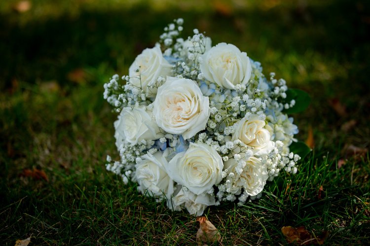 Wedding bride holding her bouquet, detail 3 by Domenic Graziano Flowers