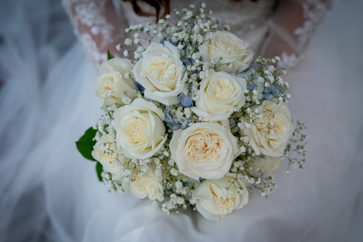 Wedding bridal bouquet with the gown, detail 4 by Domenic Graziano Flowers