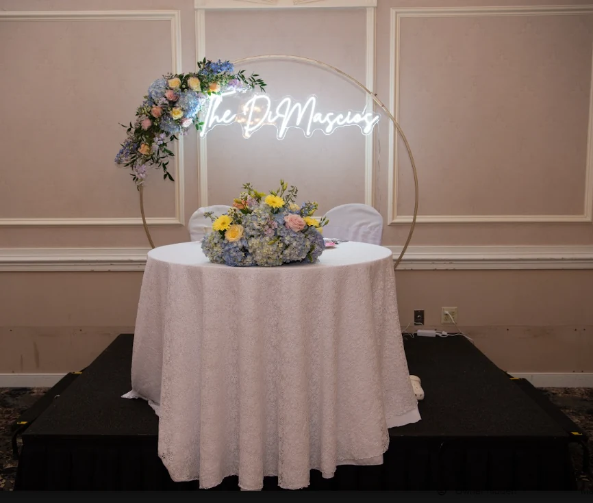 Coughlin-DiMascio wedding sweetheart table and crescent arch by Domenic Graziano Flowers