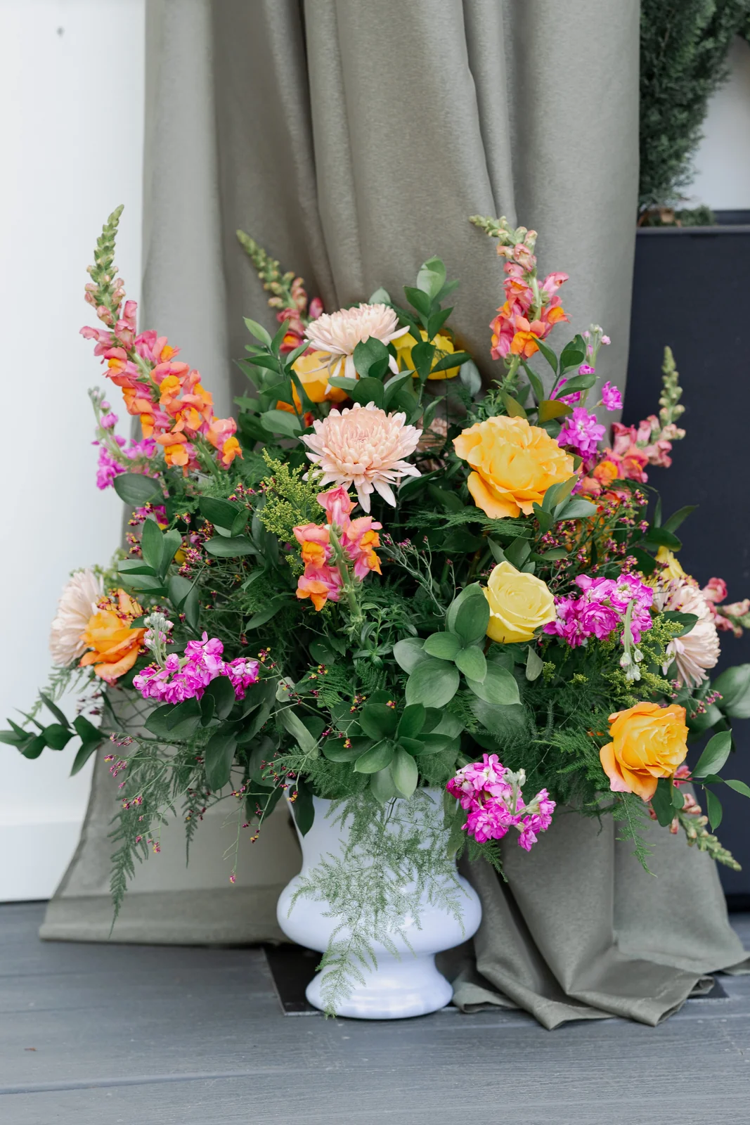 Gold wedding ceremony urn arrangement by Domenic Graziano Flowers