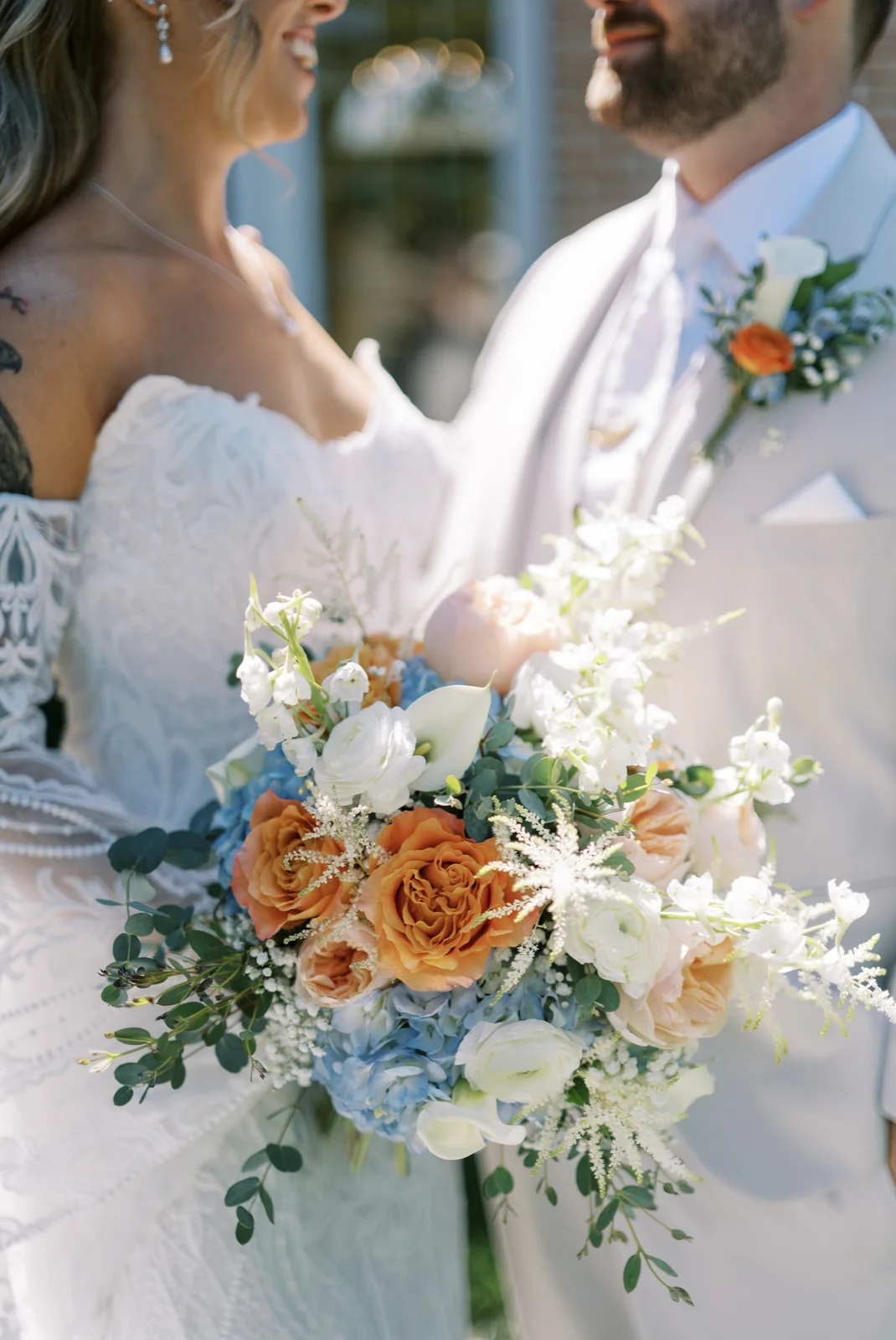 Reichel wedding bride and groom with the bridal bouquet at Spring Mill Manor by Domenic Graziano Flowers