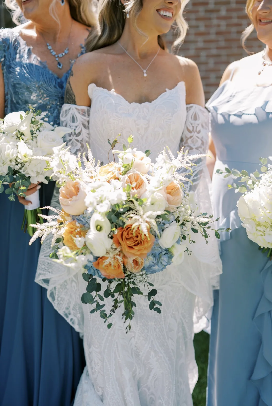 Reichel wedding bridal bouquet with the wedding party at Spring Mill Manor by Domenic Graziano Flowers