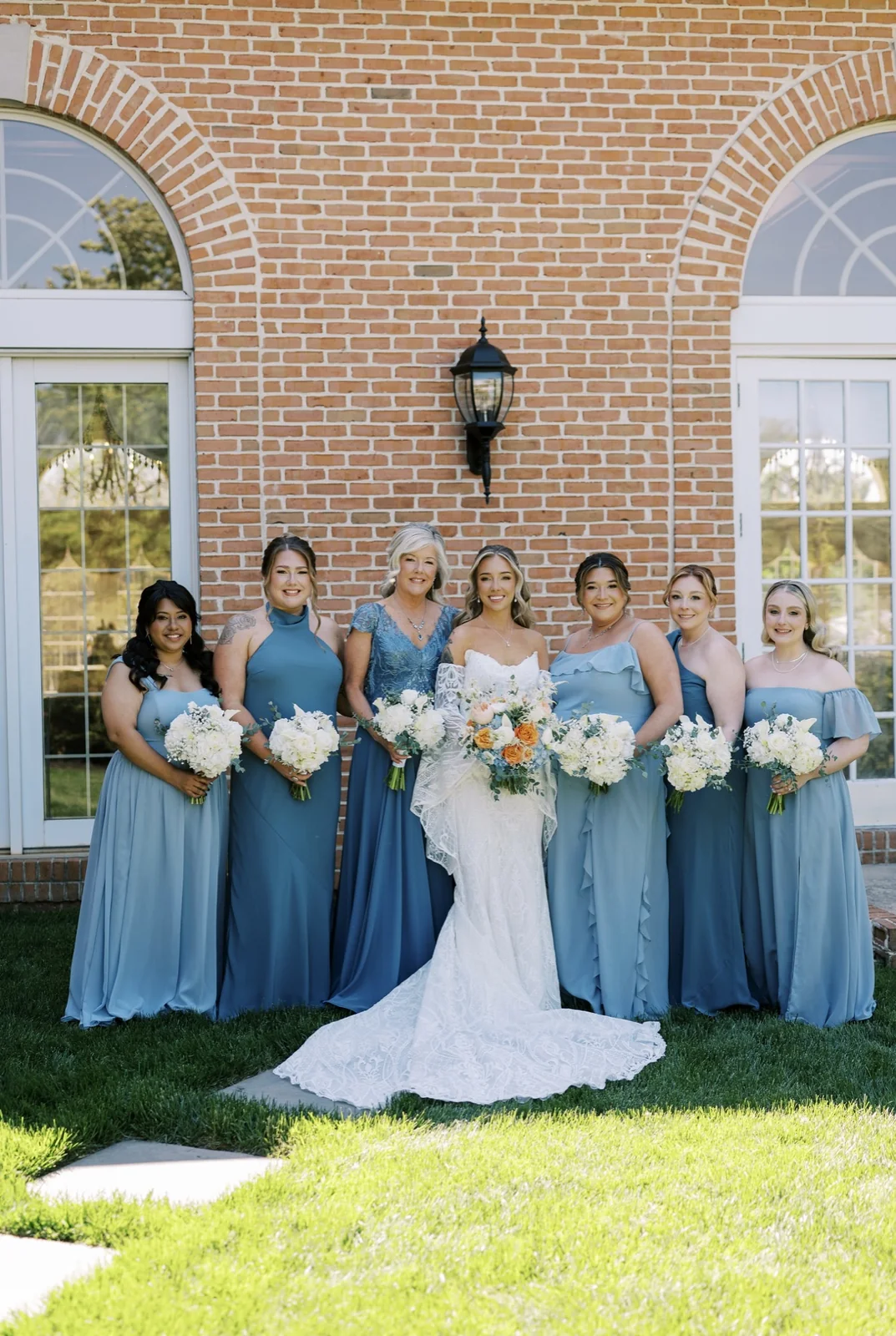 Reichel wedding bride, her mother and the bridesmaids with their bouquets at Spring Mill Manor by Domenic Graziano Flowers