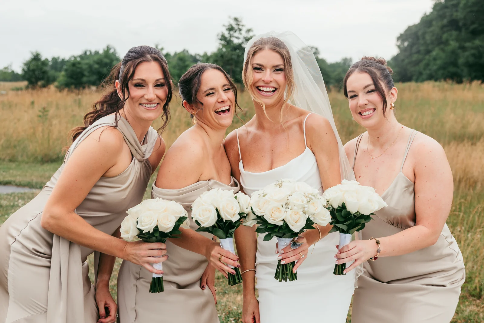 Wolfe wedding bride and bridesmaids with their bouquets at The Warrington by Domenic Graziano Flowers